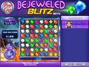 Promo screenshot for Bejeweled Blitz Beta, featuring the horrifying existence of the Orange Gem being colored green.