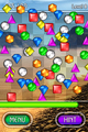 Gems being thrown off the board as a result of running out of moves from Classic mode in Bejeweled 2 (iOS).